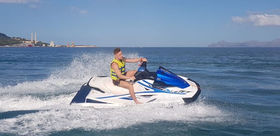 Alcudia: 30-Minute Jet Ski Adventure for Beginners & Photos - Riding past Alcudia’s long beach