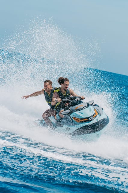 Alcudia: Bay of Alcudia Jet Ski Tour with Photos - Riding toward Faro de Aucanada