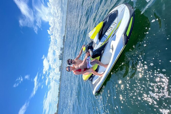 AquaFusion Combo: Jet Ski + Party Boat Excursion - Party boat time, paddle boards, and refreshments