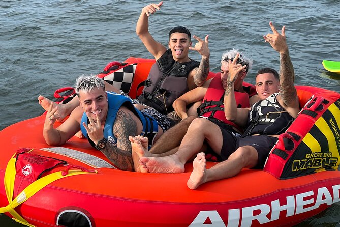 Aquatic Adventure: Boat Tour with Jetskis, Tubing, and Open Bar - Time on the party platform