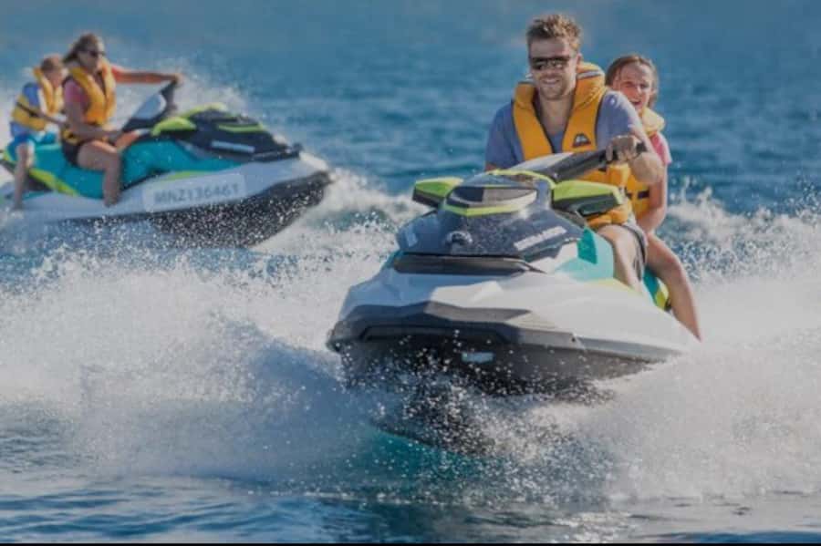 Doha: Jet Ski Adventure with Skyline and Pearl Qatar View - West Bay gives the ride its energy