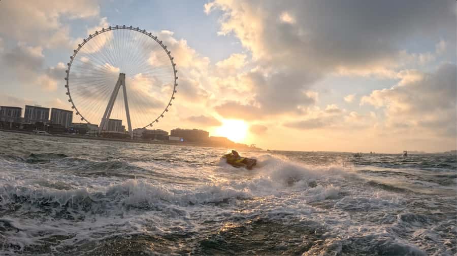 Dubai: Sunrise Jetski Tour with Guide and Photos - Ain Dubai and Bluewaters Island from the water