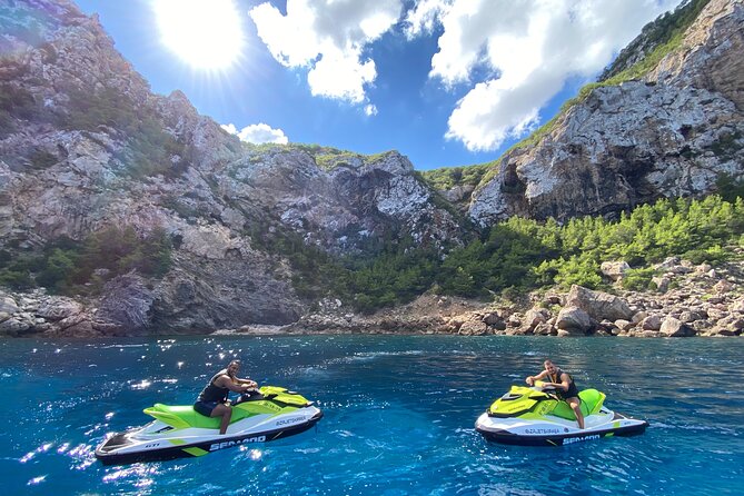 Excursion to Puertas del Cielo by Jet Ski From San Antonio - Punta Galera trades sand for flat rock