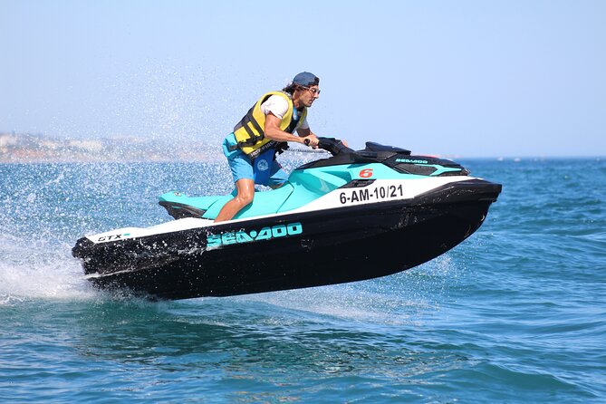 Guided JETSKI tour along the coast of Marbella, enjoy 30 minutes or 1 hour - Getting ready with a life vest and neoprene