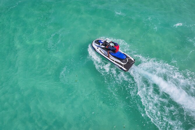 Jet Ski Adventure in Crystal Waters of Turks and Caicos - Timing, age rules, and cancellation details