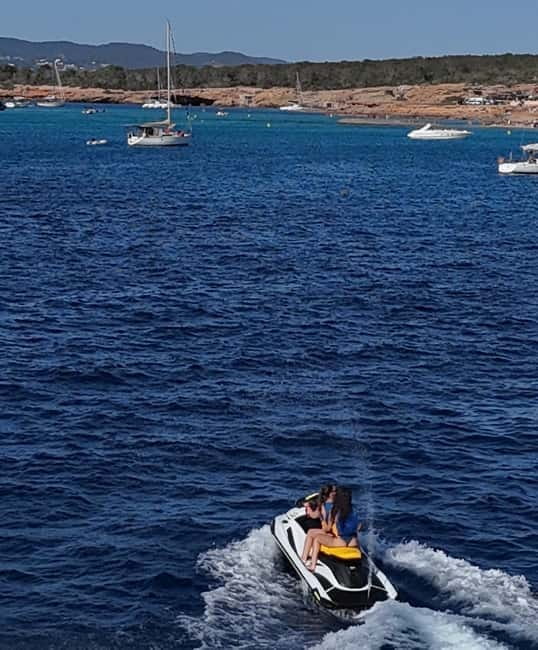 Jet Ski Adventure to the pristine Cala Conta - Meeting at the Hotel Es Pins Swimming Pool