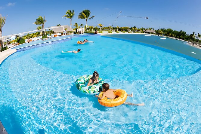 Jet Ski Punta Cana Water Park with Zipline & Inflatable Course - Holding on during the Donut Ride