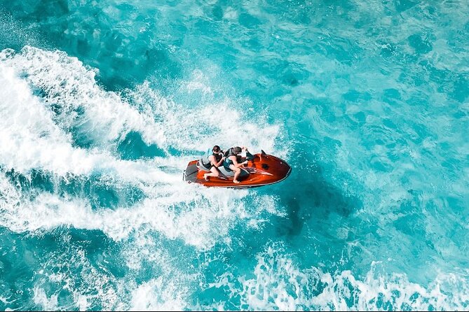 Jet Skiing around La famille ship and smaller pristine cays - Iguana Island, Half Moon Bay, and the smaller cays