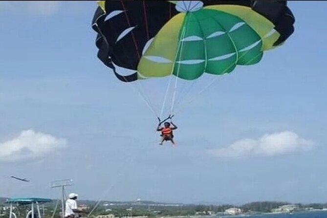 Jetski and Parasailing w/ Entry & Private Transportation - Parasailing above Montego Bay
