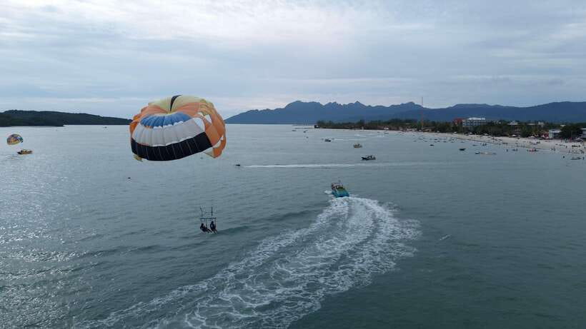 Langkawi: Jet Ski and Parasailing Tour - Beras Basah Island, the private beach, and a swim