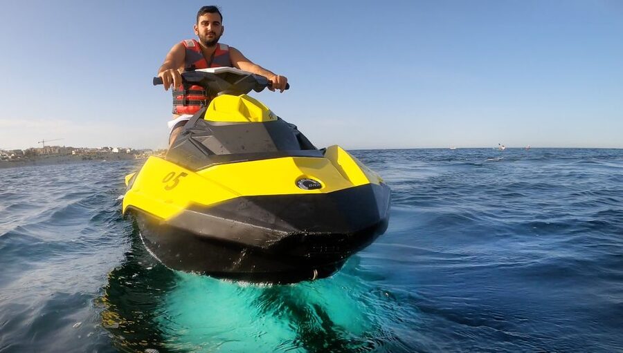 Malta: Private Jet Ski Experience - Leaving St Thomas Bay at a gentle pace