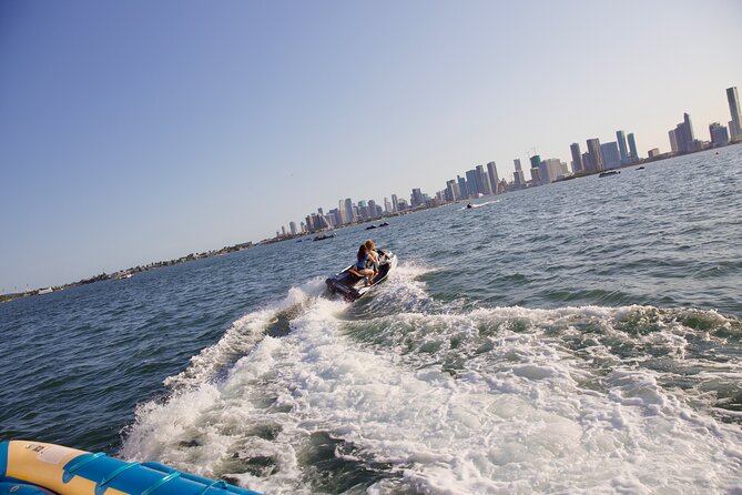 Miami Catamaran & Watersports: Jet Ski, Banana Boat & Drinks - Jet skis with a Downtown view