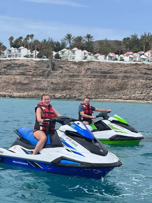Morro Jable: Guided Jet Ski Safari (without license) - Morro Jable Lighthouse and the short swim stop