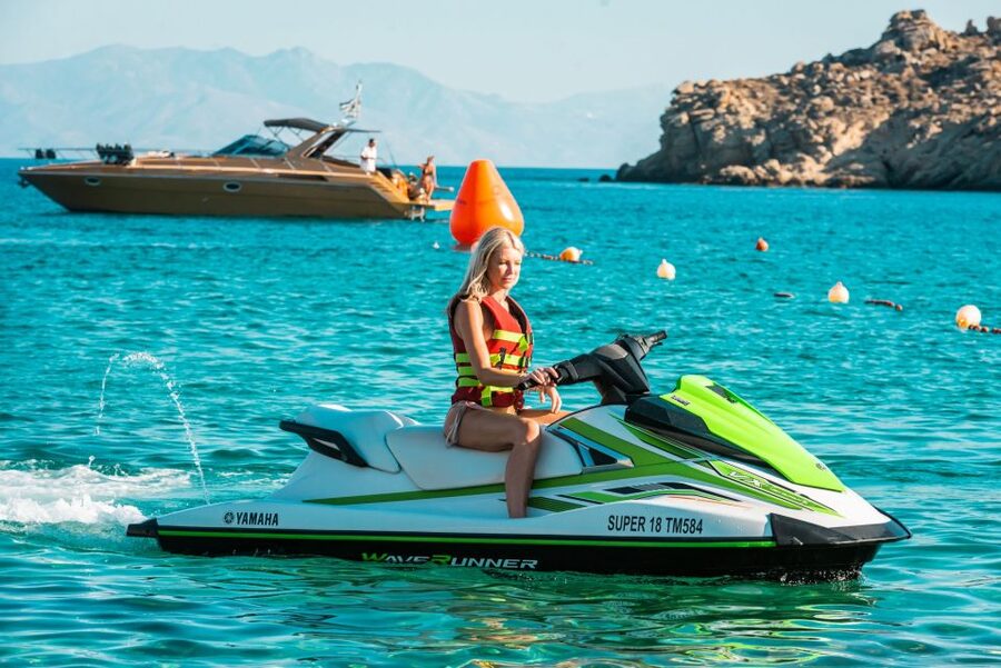 Mykonos: Super Paradise Beach Jet Ski, Canoe, & SUP Rental - SUP boarding when the wind cooperates