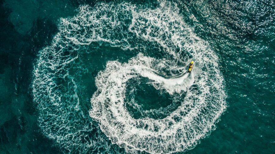 Mykonos: Super Paradise Beach Jet Ski, Canoe, & SUP Rental - Exploring Super Paradise Beach from the sea