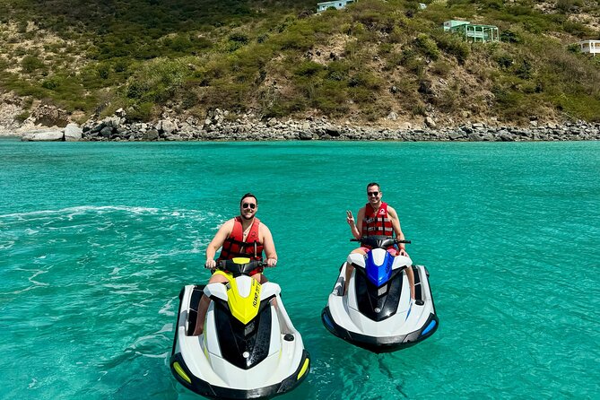 One hour private jet ski tour in Saint Martin with free passenger - The quiet shoreline at Happy Bay