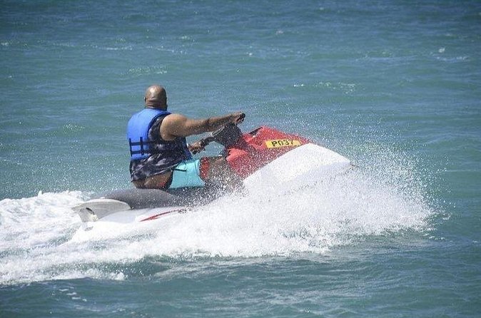 Private Jet Ski Adventure at Tropical Bliss Beach - Booking, weather, and cancellation details