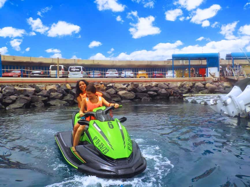 Puerto Colón: Yamaha Jet Ski Tour Along Tenerife's Coast - Riding out from Puerto Colón