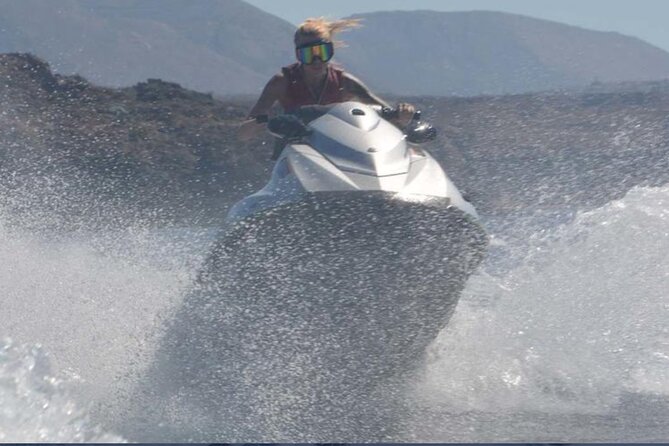 Santorini: Perivolos Beach Jet Ski Rental - Taking the Yamaha Sport Jet Ski onto the Water