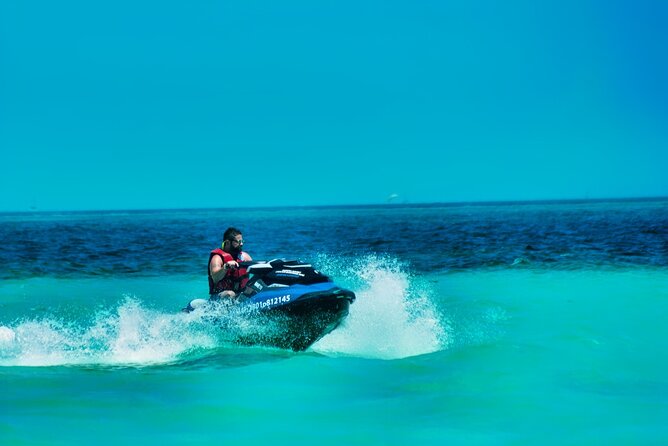 Speedboat across the Mangroves & Snorkel with Jet Ski Rental - Snorkeling near Punta Nizuc and the MUSA statues