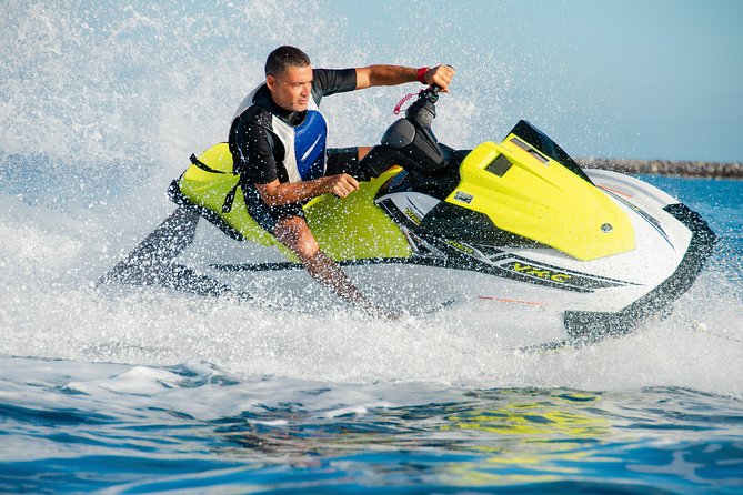 Waters Sport Package with 40 min. Jet Ski and Parasailing 1 person - Meeting at Puerto Colón in Adeje